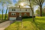 First time ever on the market! Designed by the original homeowner, an engineer, this corner home with hillside views is perfect for multigenerational living or an investorâ€™s multifamily dream. First floor offers 2 bedrooms, 1.5 baths, sunroom, and living/dining with a brick fireplace; second floor features 3 bedrooms, 1.5 baths, terrace, and separate living/dining with another fireplace. Full walk-out basement spans the house with 800+ sq ft and two exits. Full garage plus street parking, tucked away on a serene, quiet block with green space for outdoor enjoyment.