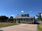 Welcome Home to this Large and bright expanded Cape style house. Possible Mother/Daughter/Accessory Apartment with Proper Permits. Well Maintained with a new roof 2 years, New siding, Updated windows, New Oil Tank and updated Heat. Full finished basement with outside entrance. Large Patio in Back Yard, Front Porch and Brick Driveway. Huge Master bedroom on first floor. Conveniently located to Southern State Parkway and Transportation. Move right in!!!
