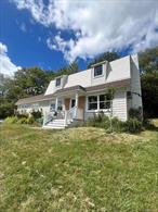 Renovated 4-Bedroom Home with Lake Rights on One Acre.Set back on a peaceful hill, this renovated 4-bedroom, 2-bath home combines privacy, modern updates, and outdoor enjoyment. Nestled on a one-acre lot with fruit trees and a garden, the property also includes deeded lake rights to Sackett Lake, perfect for boating, fishing, and summer fun.Inside, youâ€™ll find bright living spaces, a modern kitchen, and two beautifully refreshed full baths. The bedrooms are spacious and inviting, ideal for family, guests, or a home office.A 2-car garage and paved driveway provide convenience, while the elevated setting offers a quiet retreat feel. Whether youâ€™re relaxing at home or enjoying the lake, this property has it all.