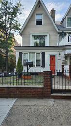 This legal two-family residence, situated in the vicinity of Riverdale, features a two-car garage and two legal outdoor parking spaces, providing a combined capacity for up to six vehicles. Each unit has a separate entrance for privacy. First Floor: 2 bedrooms, 1 full bath, open-concept layout, modern marble kitchen countertops, and washer/dryer hookups. Second & Third Floors (Duplex Unit): 2 bedrooms, 1.5 bathrooms, open-concept design, marble kitchen countertops, and in-unit washer and dryer. Basement: Accessible from the ground floor, offering ample space to be converted into an additional unit or combined with the first floor as a duplex
