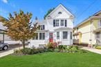 Extra Large 2 family home in the heart of E Rockaway. New Anderson windows, brand new roof, updated 1st floor. 1st floor is a 1 bedroom, 2nd floor is a 1 bedroom. Basement cellar for storage only & washer/dryer. Nice size property. close to LIRR, schools, & shops.