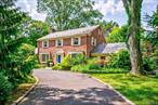 Dreamy Harbor Acres 4 bed/3.5 bath classic center hall brick Colonial set on an exquisitely landscaped flat acre, with formal English garden and expansive entertaining patio. This home offers the perfect blend of comfort and sophistication and is located on one of the most coveted streets in Sands Point. Every room you could possibly need and more! Custom chefâ€™s kitchen with Wolf appliances and center island, well-appointed butlerâ€™s pantry with beverage center and filtered water wet bar, gracious formal dining room, formal living room with wood-burning fireplace, large den with coffered ceilings and French doors to garden. First floor bedroom suite, home office, mudroom/laundry and powder. Incredible 3 season screened porch with infrared heaters to enjoy the yard views. Primary suite includes a spa bath with steam shower, soaking tub, radiant heated floors and huge bedroom-sized walk-in closet. 2 additional spacious bedrooms and updated marble bath. Full lower level with recreation, gym, art/craft room, storage and OSE. 2-car attached garage. CAC. Private association tennis, beach and dock with fee. An exceptional residence for everyday living.