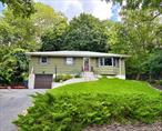 Move right into this beautifully maintained home in the sought-after Herod Point section of Wading River, just moments from the beach with private community access. This bright, nestled residence showcases pride of ownership throughout, featuring gleaming wood floors, a spacious living room, a formal dining room with access to the deck, and a well-equipped kitchen with propane range. The first-floor bath includes a double sink vanity, and all bedrooms are generously sized with ample closet space.The newly refinished full sub-level basement adds incredible versatility with additional square footage that offers open flex space, an additional full bathroom, plenty of storage, washer/dryer area, and convenient interior and garage entry.Outdoors, the back deck provides a tranquil setting with ample space for entertaining. The extended driveway allows for plenty of parking. Private community beach access is just a short distance away.Donâ€™t miss this move-in ready opportunity in one of Wading Riverâ€™s most desirable communities!
