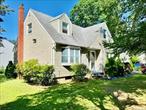 Lovely Expanded Cape In The Heart Of Mastic Beach!! Just Shy Of 1800 SF Of Living Space!!! Situated On A Beautiful Corner Lot Just Shy Of a Quarter Acre, First Floor Boasts A Front Porch Entryway, Foyer/Laundry Room, Bright And Airy Huge Formal Living Room With A Fireplace And Large Dining Area, Rear Door Opens Up To A Backyard Deck Overlooking A Peaceful Backyard For Outdoor Entertaining And Enjoyment,  Three Large Bedrooms With Hardwood Flooring And A Full Bathroom, Second Floor Boasts Two Large Bedrooms and A Full Bathroom, One Car Attached Garage For Vehicle/Storage, Full Unfinished Basement With Inside Entrance And Outside Walkout Entrance, Just Minutes Away From Smith Point Fire Island Nation Seashore Ocean Beaches, Parks, Marinas, Boating Fishing, Shopping, Restaurants, Public Transportation, Train Station And Highways, NO Flood Insurance Required!!! LOW TAXES!!! Make This Home Your Own!!!