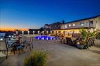 Welcome to one of Baldwin Harborâ€™s most extraordinary waterfront propertiesâ€”an outdoor enthusiastâ€™s dream and a rare opportunity to own a truly one-of-a-kind coastal retreat. Positioned along 92 feet of open bay frontage with unobstructed southern and western exposure, this stunning home offers panoramic water views, breathtaking sunsets, and front-row seats to fireworks displays and concerts at Long Beach and Jones Beach. With quick access to the Atlantic Ocean, the property boasts a large dock, boat lift, and every amenity needed for seamless waterfront living. The resort-style backyard is nothing short of spectacular, featuring a heated gunite pool with captivating lighting effects, a hot tub, full outdoor bathroom, custom outdoor kitchen, and multiple seating areas designed for relaxation or entertaining on a grand scaleâ€”all set against a backdrop of open bay views. Inside, the home has been completely renovated down to the studs, combining thoughtful design with sophisticated finishes. Every south-facing window offers uninterrupted bay vistas, while floor-to-ceiling glass and sliding doors blur the lines between indoor and outdoor living. The custom chefâ€™s kitchen is a showpiece, complete with Viking appliances, stunning stone countertops, and designer lighting, seamlessly connected to a gracious dining area, family room, and additional lounge space. The layout includes five bedrooms and four uniquely designed bathrooms, including a breathtaking primary suite with a walk-in closet and the convenience of second-floor laundry. Two access points lead to the expansive upper-level bayfront deckâ€”an idyllic spot for sunset cocktails or morning coffee. Additional features include a working fireplace, central air and smart thermostats in every room, Radiant Heat Flooring, solar panels for energy efficiency, and a one-of-a-kind wellness retreat complete with a salt cave, cold plunge, and sauna. Beautifully designed pavers create a low-maintenance backyard oasis that feels both private and luxurious. Every inch of this home has been curated for those who crave beauty, functionality, and a deep connection to the water. Whether you&rsquo;re looking for a year-round residence or a seasonal escape, this property delivers the ultimate coastal lifestyleâ€”effortless, elegant, and entirely unforgettable. Icing on the cake? This property is NOT in a Flood Zone, offering every benefit the beautiful waterfront can offer us, without any downside.