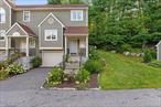 Move right into this beautifully maintained, sunny and bright 2 bedroom, 2.5 bath end unit in sought-after Guard Hill Manor. The home offers a neutral palette, inviting flow, and numerous updates including energy-efficient windows (2016), central air, newer appliances, gas fireplace (2018), water heater (2021), and freshly cleaned wall-to-wall carpeting (2025).The living room with sliding doors opens to a private deck and flagstone patio bordered by mature perennial plantings. The eat-in kitchen features Swanstone countertops and resurfaced cabinets. Upstairs are two bedrooms with ensuite baths, laundry. Lower level provides spacious storage, utilities, and access to the garage with tiled floor (2017).Guard Hill Manor residents enjoy outstanding amenities including a pool, tennis, playground, and basketball court. Convenient location just minutes to Metro North, shops, and restaurants. Taxes do not include STAR deduction.