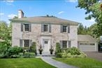 Welcome to 8 Varian Laneâ€”a stunning Colonial situated on a tranquil cul-de-sac in the sought-after Greenacres neighborhood of Scarsdale. Set on .33 acres of level, professionally landscaped property, this beautiful home was fully renovated in 2020 with high-end designer finishes and is ready for you to move right in. The first level offers an ideal layout for both everyday living and entertaining, with generously proportioned rooms and an abundance of natural light. The formal living room features a wood-burning fireplace, multiple window exposures and flows seamlessly into a sun-drenched family room. The expansive family room is surrounded by windows and provides easy access to the backyard for seamless indoor and outdoor living. The adjacent designer kitchen is the heart of the home, boasting a large quartz island with seating for four, a bright breakfast area framed by walls of windows, custom cabinetry, an oversized Thermador refrigerator and freezer, Thermador oven, Bosch dishwasher, Zephyr beverage cooler and two sinks. French doors lead from the kitchen to the sophisticated formal dining room, perfect for hosting family and friends. A luxe marble powder room, pantry closet, coat closet, and mudroom off the attached garage complete this level. Upstairs, the spacious primary suite features vaulted ceilings, serene views of the backyard, two fully outfitted California Closets, and an ensuite spa bathroom with radiant heated floors, double vanities, and an oversized shower. Three additional light-filled bedrooms, each with hardwood floors and California Closets, share a well-appointed hall bath. The finished lower level offers flexible space for a playroom and/or gym, along with a separate laundry area and ample storage. Outside, enjoy a backyard oasis with lush plantings, a new bluestone patio with built-in firepit and sitting wall, and plenty of space to relax and play. A newly installed driveway and walkway enhance the curb appeal of this charming whitewashed brick Colonial. Located just minutes from the Greenacres Elementary School, a National Blue Ribbon School, Scarsdale Village, and only 30 minutes to Grand Central Terminal via Metro North. Donâ€™t miss this Greenacres gem!