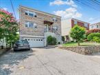 Introducing 55 AKA 57 Mansion Avenue. This bright and spacious 2 family is located within the highly sought after Dunwoodie section of East Yonkers. Two 3 bedrooms units featuring sun filled living rooms, formal dining rooms, kitchens with stainless steel appliances, full baths and spacious bedrooms. Harwood floors and plentiful closet space throughout. Walk out lower level. Flat level rear yard perfect for large family gatherings. New front brick veneer (2019).  2 car garage with additional driveway parking to accommodate additional vehicles. This home is a commuters delight. Just 5 min to all of your Yonkers Avenue and Cross County shopping and dining needs. Close proximity to Cross County, Bronx River and Hutchinson River Pkwys and Metro North. Recreational opportunities galore. This home is a must see and true pleasure to show.