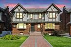Welcome to this stately English Tudor nestled in the highly sought-after Indian Village neighborhood. Brimming with charm and character, this semi-attached home makes a memorable first impression with its rustic wood front door and timeless curb appeal. Step inside to a welcoming foyer that leads to a sun-drenched living room featuring gleaming hardwood floors, a classic brick wood-burning fireplace, and an elegant bay window that floods the space with natural light. The formal dining room is adorned with an ornate chandelier and sliding doors that open to your private balcony, perfect for seamless indoor-outdoor entertaining. The thoughtfully designed galley kitchen offers granite countertops, oak cabinetry, and stainless steel appliances for a stylish and functional workspace. Upstairs, youâ€™ll find three comfortable bedrooms and a beautifully updated hall bath. The lower level includes a walk-out basement that provides flexible space ideal for a family room, game area, or home office, plus a dedicated laundry area. A private shared driveway offers ample parking. Enjoy the convenience of being just a short stroll to shopping, dining, schools, libraries, hospitals, and parks with easy access to trains, buses, and major highways. This is a rare opportunity to own a home that perfectly balances classic character with modern comforts in one of the area&rsquo;s most desirable locations.