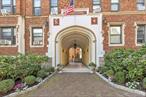 Exceptional and rare offering at Tudor Arms! This spacious 2-bedroom, 2-bath residence with bonus room blends timeless pre-war charm with modern convenience just steps from Bronxville Village and Metro North. Sunlit rooms with high ceilings include a large primary suite, second bedroom with hall bath, versatile bonus room, eat-in kitchen, and living/dining area. Enjoy tranquil courtyard views and abundant natural light throughout. Building amenities include brand-new laundry, fitness center, secure mail room, bike storage, EV charging, and landscaped private courtyard. Garage parking available by waitlist, with additional street parking through Yonkers permit. Cats welcome. Ideally located approx. .3 miles from Bronxville Metro North (30 min to GCT), shops, dining, and Bronx River trails. A rare gem not to be missed!
