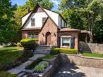 Welcome to this charming, updated Tudor-style home in South Nyack, offering timeless character and modern comfort in a move-in ready package. Built in 1933, the home features beautifully refinished original details throughout, including natural hardwood floors, and classic architectural touches that speak to its heritage. Step into the living room and enjoy the warmth of the original stone fireplace, complete with a wood mantel and flanked by built-in bookshelvesâ€”a stunning focal point that anchors the space. The formal dining room and entrance foyer add to the homeâ€™s elegant flow. Located less than 30 miles from Manhattan/NYC and a short distance to commuter bus and train service to New York City, this property offers a convenient and efficient commute while maintaining privacy and proximity to the river. As a bonus, the Esposito trail linking Nyack and Piermont is less than a block away. The backyard is ideal for entertaining, with a peaceful setting that feels tucked away yet connected to everything. The chefâ€™s kitchen has been thoughtfully renovated to balance classic style with modern functionality. It features a Viking stove and refrigerator, Bosch dishwasher, custom cabinetry, deep sink, wine fridge, and granite countersâ€”perfect for everyday cooking or hosting guests. Upstairs, the recently renovated primary bathroom combines comfort and style with heated marble floors and updated finishes, all while preserving the homeâ€™s Tudor charm. This home blends original craftsmanship with contemporary/current/present day upgrades, offering a rare opportunity to enjoy historic character without compromising on current amenities. You really need to see this home and make it yours! Roof replaced 2015, Boiler replaced 2021, Hot water heater replaced 2022, new washer & dryer 2023. Kitchen renovations with new appliances was in 2017. Wood floors on first floor refinished 2017; 2nd floor 2022. 2nd floor bathroom complete renovation 2022 (including new pipes, radiant heat in the marble flooring, reglazed tub, and much more.)