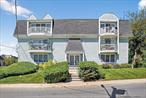 A hidden gem at 37 Harbor Lane. A rare opportunity to live a coastal lifestyle. Suburban elegance on the waterfront in vibrant New Rochelle. This contemporary condo exudes charm, modernity and sophistication. This is the ideal canvas for your dream lifestyle.Undeniable curb appeal, this meticulously maintained condominium invites you to discover a world of peace and comfort. Step inside and you will uncover a thoughtfully designed layout. A generously sized bedroom awaits you which boasts two walk-in closets with recessed lighting. The bedroom is complemented by a modern, spacious bathroom. This will help to ensure a sanctuary of relaxation.As you enter your new home you will be greeted by a welcoming balcony that overlooks Neptune Pond. What a view to behold! Entertain with ease in a light and airy, open concept living/dining room area where you will enjoy leisurely moments.The galley kitchen is appointed with stainless steel appliances and recessed lighting. The stove is powered by gas. You will have roomy cabinetry to meet your storage needs and a in-sink-erator.Carport space number 5 is assigned this unit. Any additional parking space required is on a first come, first serve basis and itâ€™s free. Access to the building is available from the parking lot. The HVAC system provides central heat and central air. Hot water is supplied by an adjacent hot water tank. A locked storage room, at no additional cost comes with the unit and laundry facilities are available on the lower level to use with a reloadable card. Nearby amenities include Neptune Park right outside your front door as well as Glen Island Beach and Park which are within walking distance. New Rochelle also offers other parks close by including, Hudson Park, Davenport Park and Five Islands Park. In the area you will also find trendy restaurants, supermarkets and public transportation options. The Metro North to Grand Central can be accessed via The New Rochelle Train Station (covered monthly parking at a fee) or The Pelham Train Station (monthly uncovered parking at a fee). The commute time is 33 minutes. Amtrak is also available to destinations north and south. In your consideration of this building be advised that it is pet friendly. A cat or a small to medium sized dog is permitted. The indoor environment is smoke free however smoking is allowed on your balcony. Balcony overlooking the pond.Seize this unique opportunity to make this remarkable home your own. Schedule your private showing today and envision the endless possibilities awaiting within these walls. This exquisite home eagerly awaits its next chapter â€“ yours.