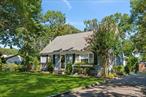Nestled on a quiet, tree-lined street south of the highway, this immaculate coastal Cape embodies the perfect balance of relaxed living and refined modern upgrades.Set on a beautifully manicured .26-acre lot, the well maintained home offers approximately 1, 4000 +/-square feet of thoughtfully laid-out living space PLUS additional 276 +/- sft sunroom. The main level features two spacious bedrooms and a full bath, while the upstairs hosts a generously sized en-suite third bedroom, offering comfort and privacy. At the heart of the home lies a completely remodeled eat-in kitchen, outfitted with top-of-the-line Samsung Bespoke appliances and elegant finishes. Designed for both functionality and style, the kitchen opens seamlessly into a brand-new sunroom â€” a radiant space; ideal for three season enjoyment, perfect as a second living room or additional dining area. Additional interior features include a formal living room, central air conditioning for year-round comfort, and a full unfinished basement with laundry and ample storage â€” offering endless potential for future expansion. Step outside to your private backyard oasis, where impeccably landscaped grounds with irrigation create a peaceful, low-maintenance environment. An outdoor shower adds a quintessential coastal touch, making beach days even easier. The backyard offers the ideal setting for al fresco dining, entertaining, or quiet relaxation. Located just minutes from renowned Hamptons beaches, local restaurants, grocery stores, town shopping, and the train station, this home offers exceptional convenience without sacrificing serenity. Whether you&rsquo;re seeking a year-round residence, a weekend retreat, or a savvy investment, this turn-key home is ready to deliver the Hamptons lifestyle you&rsquo;ve been dreaming of.