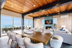 5 year seller financing at 5.75% available. This fully renovated oceanfront estate offers a blend of modern luxury and coastal charm, featuring extensive upgrades and spacious indoor and outdoor living areas. The property is designed to maximize ocean views and privacy, with strong potential for future expansion and development.The home was rebuilt to the studs in 2024, including new cedar siding, HVAC, electrical, and plumbing systems while maintaining architectural integrity.The upper level features 10-foot cedar ceilings, floor-to-ceiling glass, a chefâ€™s kitchen with high-end appliances, and a primary en-suite, all designed to enhance the oceanfront experience. Multiple outdoor seating and dining areas create seamless indoor-outdoor living.The property includes four additional en-suite bedrooms on the lower level opening to an ocean-facing deck with a hot tub, a heated pool with mahogany decking, fenced yard, and an outdoor powder room.The oversized lot and location relative to the dune allows for interior expansion, oceanfront deck extension, and/or pool relocation.The house boasts a strong rental history and comes fully furnished with transferable permits for private beach access and a Polaris 570 Ranger.