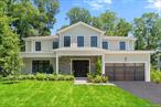 Sophisticated New Build in sought after Quaker Ridge! Be the first to call this architecturally stunning residence your own. Expertly designed and built by a licensed NYS Professional Engineer, this unrivaled new construction offers modern elegance, luxurious finishes, and thoughtful design throughout. Step into a grand open-concept layout featuring a show stopping great room with soaring 20-foot ceilings, the perfect space for entertaining or everyday living. The heart of the home is the ultra-modern chefâ€™s kitchen, complete with top-of-the-line appliances, sleek cabinetry, and generous prep space. The main level also features a private home office or guest suite with a full bathroom, a separate den or library nook off the dining area with gas fireplace and a custom-designed mudroom with built-ins and direct access to the attached two-car garage. Enjoy seamless indoor-outdoor living with multiple access points to a covered veranda, and beautifully landscaped backyard with a potential pool site (BAR approval required - pool not included in sale price). Upstairs, a dramatic catwalk overlooks the foyer and leads to four spacious bedrooms, including a decadent primary suite ready for your personal customization. The finished lower level adds even more living space, featuring a large recreation/media room, an additional bedroom, full bathroom, and ample storage. Located in the highly desirable Quaker Ridge neighborhood, just minutes from playgrounds, shopping, dining, transportation, and more!