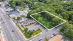 Prime commercial development opportunity! Vacant lot zoned J6, measuring 109 x 200 ideally located just 1 building south of Montauk Hwy with excellent exposure. Situated just east of William Floyd Pkwy, this commercial lot is surrounded by shopping centers, banks, stores and restaurants ensuring high visibility and steady traffic. Fully approved to build a 6000 sq ft 2 story retail/office building with elevator. All Plans and approvals included in sale. Neighboring a bank and across the street from a thriving shopping center, this site offers an exceptional investment or end user opportunity!