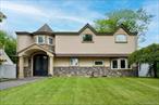 Welcome home to this sun-drenched east facing colonial, where timeless character meets modern elegance originally built in 1948 and reimagined in 2022, this residence is perfectly situated on .28acre lot and offers approximately 2500 sqft of thoughtfully designed living space.The first floor features a bright chefâ€™s kitchen with quartz countertops, island with waterfall, farm sink and top-of-the-line appliances, living room and dining room, 1 bedroom currently used as family room and 2 full bathrooms for added convenience.Upstairs includes master suite with custom walkin closet and bathroom with jacuzzi and shower, 3 generously sized bedrooms and 1 full bathroom.Additional features: security cameras and system, modern finishes, and ADT security system. This home is zoned to have a Pool Pass to the Levittown Community Pool with no cost.