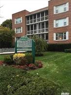 Nestled in the vibrant center of Lawrence, this sun-filled apartment offers unbeatable convenienceâ€”just steps from local shops, restaurants, grocery stores, and salons. Located on the second floor with elevator access, it combines comfort and accessibility.Enjoy peaceful moments on the bonus screened-in porch, perfect for reading or soaking in the natural surroundings. Laundry is a breeze with a washer and dryer located right inside the buildingâ€”no need to step outside. Parking spaces are available, by application, making this home as practical as it is charming.