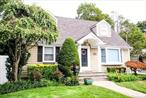 Welcome to this fabulous expanded Cape with rear dormer, perfectly set on an oversized 55x150 property. This beautifully maintained 8-room home with a fully finished basement offers the ideal blend of charm, comfort, and modern updates. Gleaming hardwood floors flow throughout the spacious interior, featuring a large formal living room and dining room for elegant gatherings.The bright and open **new kitchen** is the heart of the home, showcasing sleek stainless steel appliances, abundant cabinetry, and a generous island with seating for fiveâ€”perfect for casual meals and entertaining. Just off the kitchen, the cozy **family room** boasts a wood-burning fireplace, cathedral ceilings, and skylights flooding the space with natural light. lead out to an expansive deck, a huge paver patio, and a fully fenced, park-like backyard with a bonus above-ground poolâ€”an entertainerâ€™s dream.Additional highlights include a huge 2-car detached garage, in-ground sprinklers for easy lawn care, and a separate hot water heater, 4 zone heating system and split unit system in every roomproviding A/C and het. With every detail meticulously cared for, the property is in move-in ready!A rare gem that combines comfort, functionality, and styleâ€”perfect for relaxing at home or hosting unforgettable gatherings.