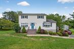 Meticulous 4 bedroom Colonial,  Beautiful updated! Nothing to do! Spacious & Gracious! Neutral decor! A MUST SEE! Enjoy Pine Tree beach & lake. Parklike landscaped setting & level backyard. Municipal services, Central air,  Min to NY train, bus, highways & Woodbury Commons, state parks and more, Granite kitchen & stainless appliances, Anderson windows, Newer baths bath, paved driveway, trex deck , Wood floorrs throughout, Walkout basement/rec-room. Enjoy Pine tree Lake with a low membership of House $200 a year.
