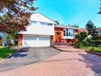 Rare Opportunity in the Highly Desirable Wedgewood Section of Oceanside!Welcome to this beautiful and thoughtfully done split-level home featuring 4 bedrooms and 3 updated full bathrooms, including a primary en-suite and a private lower-level bedroom ideal for guests or family, or a home office.The main floor offers a formal living room, formal dining room, den with access to a large deck, and an eat-in kitchen with two sinks, two dishwashers, double oven, and abundant natural light.The top level includes the primary suite with full bath, two additional bedrooms, and a full hallway bath.The lower level provides even more living space with a second den that can double as a playroom, a full bath, backyard access, and the fourth bedroom.Other highlights include central AC, whole-house generator, in-ground sprinklers, five-year young roof, tremendous curb appeal, and a backyard with both a great deck and a pleasant grassy area.This home presents a fantastic opportunity. Do not miss it!