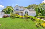 Beautiful Well kept Colonial with Front porch and immaculate land escaping, beautiful back yard with full privacy . Sun room , full finished basement with outside entrance. summer kitchenEnergy effecient windows , solar panel, washer dryer , office or seperate sitting area and much more .