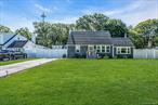 Welcome to this Meticulously Updated 4-Bedroom Expanded Cape in West Islip Schools! Offering 4 bedrooms, 2 full baths, and a bright open layout designed for todayâ€™s lifestyle. The main level features gleaming hardwood floors, ductless air conditioning, and a spacious eat-in kitchen with granite countertops, center island, peninsula, coffee bar, pantry, and stainless steel appliances â€” perfect for everyday living and entertaining.Unwind in the cozy den with a brand-new custom stone wood-burning fireplace, 2 main-floor bedrooms with generous closets and an updated full bath. Upstairs, youâ€™ll find two oversized bedrooms with abundant storage, new flooring, ductless air conditioning, and a second updated bathroom.The full, unfinished basement with laundry and outside entrance offers endless potential â€” whether for a home gym, playroom, office, or future guest suite.Step outside to your private backyard oasis: a PVC-fenced oversized yard with composite decks and PVC railings, grilling pergola, playset, and new paver walkway â€” ideal for summer barbecues, gatherings, and everyday relaxation.Additional updates include newer siding, windows, roof, blacktopped multi-car driveway, upgraded 200-amp electric, gas heat, and a high-efficiency Navien water heater.Located in the desirable West Islip School District and close to beaches, parks, shopping, and major highways, this home combines comfort, style, and convenience. Truly move-in ready, all thatâ€™s left to do is unpack and enjoy!