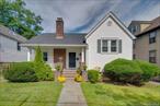 Welcome to this beautifully updated home in Harrisonâ€™s highly desirable Station Park neighborhood. Completely renovated within the past five years, this residence blends classic charm with modern conveniences. The sun-filled kitchen is a chefâ€™s delight, featuring stainless steel appliances, quartz countertops, and a stylish tile backsplash. A door from the kitchen opens to the deckâ€”perfect for effortless indoor/outdoor entertaining. The adjoining living and dining rooms showcase hardwood floors, elegant crown moldings, and a wood-burning fireplaceâ€”ideal for cozy winter evenings. All bedrooms boast hardwood flooring, with two enjoying double exposures for abundant natural light. Both bathrooms were fully renovated in 2020 with tasteful finishes. Bonus spaces include a finished 3rd floor plus a separate room off the garageâ€”ideal for office, gym, or studioâ€”making this home live larger than its square footage suggests. Practical updates make living easy, including a new roof (2023), central air conditioning, and 200-amp electric service.  Perfectly located just blocks from Metro-North, enjoy a quick 41-minute express train to Grand Central. Schools are within a quarter-mile, and the neighborhoodâ€™s conveniences are at your doorstep. With low taxes, this home is not only stylish and functional but also a smart and affordable choice.