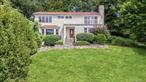 Elegant 3-Bedroom Retreat with Hudson River Views near Sleepy Hollow Country Club. Nestled on a peaceful cul-de-sac, this stately 3 bedroom, 2.5 bath home offers refined living with breathtaking views of the Hudson River. Step inside to discover a sun-drenched formal living room featuring a beautiful bay window for taking in the view. The spacious family room was made for cozy nights, anchored by a wood burning fireplace and beautiful built-in book shelves. Enjoy memorable gatherings in the formal dining room with custom serving cabinets, or whip up meals in the gourmet kitchen; complete with double ovens, stainless steel appliances, granite countertops, and a bright eat-in breakfast area. Sliding glass doors open to an expansive backyard, blending indoor and outdoor living with ease. Upstairs, a grand staircase leads to a light-filled landing and an expansive primary suite, complete with a tranquil sitting area and spa-inspired ensuite bath. Two additional bedrooms offer generous closet space and stunning natural light, one featuring a private deck with sweeping river views. The finished full basement provides flexible space for a home gym, media or play room. The private backyard is an entertainers dream, boasting a large patio, manicured lawn and in-ground pool. With it&rsquo;s unbeatable amenities and location, this home offers the best of serene suburban living. Donâ€™t miss your chance to make this extraordinary home yours!