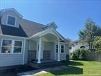 Fully renovated home located in the Commack School District. Situated on a spacious lot, this property has been updated throughout including roof, windows, siding, mechanicals, and interior finishes. The main floor offers a primary bedroom with en suite bathroom. Renovation details provide a move-in ready home with modern upgrades inside and out.