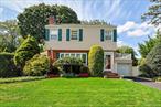 Welcome to this timeless Colonial, perfectly situated on an expansive 90x100 property in the highly sought-after Westwood section of Malverne.Step inside to find gleaming hardwood floors throughout, a sun-filled living room with a cozy fireplace, and a comfortable den thatâ€™s ideal for relaxing or entertaining. The large, well-appointed kitchen offers plenty of space to cook, gather, and create lasting memories.Upstairs, youâ€™ll find generous bedrooms and ample storage, while the spacious backyard provides endless opportunities for outdoor living, gardening, or play.With its prime location, classic charm, and spacious property, this Colonial is ready to welcome its next chapter.