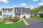 Tucked into a vibrant community just minutes from Beacon, Fishkill Village, and Wappingers Falls, this corner-unit townhome checks all the boxesâ€”and then some. Step onto the beautifully landscaped stone path and into a move-in-ready space with all the updates done for you: brand-new kitchen appliances, a new roof, a new hot water heater, and newer washer/dryer. The layout is generous, the private deck is made for unwinding, and the walkout basement and large garage add extra flex space for whatever your life needs next. Upstairs, a private en suite offers a quiet escape. Plus: central air, community pool, basketball courts, playground, and close proximity to restaurants, hiking trails, farms, and more. Itâ€™s the kind of place people stay inâ€”because they love living here.
