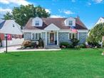 Welcome to this beautiful wide-line cape, ideally located on a quiet street in the Herricks School District, just steps from Park Circle. From the moment you arrive, the homeâ€™s curb appeal shines with its meticulously landscaped yard, new stone facade, and custom pavers accenting the driveway, walkway, and patio.Inside, youâ€™ll find a bright and inviting living room, 4 spacious bedrooms, and 3 full baths. The updated kitchen features stainless steel appliances, while the sun-drenched 4-season room (additional 152 sq ft) offers the perfect space to relax or entertain year-round. A finished basement with egress window provides additional space and versatility.Other notable features include central air, a full-house Generac generator, 3-zone heating, a tankless water heater, updated electric panel, sprinkler system, floor drain backwater value, hardwood floors, and more. Conveniently close to shopping, dining, public transportation, and all neighborhood essentials, this home seamlessly combines comfort, style, and everyday convenience.