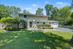 This beautifully updated 4-bedroom, 2.5-bath Colonial in the sought-after Tulipwood section of Commack is ready for you to call home. Pride of ownership shines from the moment you step inside. Enjoy cozy winter nights by the fireplace and sunny summer days by the sparkling in-ground pool. The open-concept floor plan connects the updated eat-in kitchen to the spacious den and living room, creating an ideal space for entertaining year-round. The kitchen offers ample counter space, a large island with additional seating, and a stylish wine and coffee bar for unwinding. A pantry with pull-out drawers provides plenty of storage for all your essentials, while a convenient back door off the kitchen makes summer entertaining seamless. Step outside to a stunning paver patio that wraps around the yard and leads to the beautiful pool area, perfect for gatherings. All the bedrooms are on the second floor which creates a sense of privacy to unwind after a long day. Additional features include three newer ductless split units, 200-amp electric, updated roof, siding, and cesspool. This home truly has it allâ€”come see this gorgeous Colonial for yourself!