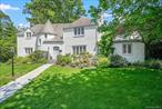 Discover the timeless allure of classic architecture, enriched with original details, in one of Larchmontâ€™s most sought-after neighborhoods! Just moments from downtown, the train station, schools, vibrant restaurants, and the scenic Leatherstocking Trail, this home offers an unbeatable lifestyle.From the moment you enter, youâ€™ll be welcomed by a grand living room anchored by an elegant wood-burning fireplace which seamlessly flows into the sun-filled family room with soaring ceilings and skylight. The bright and expansive formal dining room is perfectly placed beside the eat-in kitchen for effortless entertaining. A home office and newly renovated powder room complete the main floor.The curved staircase adds architectural character and leads to four beautifully appointed bedrooms on the second floor. The spacious primary suite is a true retreat, featuring a recently updated en suite bathroom, custom built-ins, and two oversized closets, including a walk-in. Two additional bedrooms share an updated hall bath, while the fourth enjoys the privacy of its own en suite.The lower level offers even more living space with high ceilings and another cozy wood-burning fireplace. Outside, the private backyard is designed for leisure and entertainment, featuring a Trex rear porch, two stone patios and a spacious backyard perfect for play. This is more than a home, itâ€™s a lifestyle that is waiting for you.