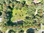 Opportunity awaits , flat, level property in prime area of Chestnut Ridge.
