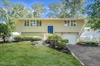 Welcome to 7 Deepdale Drive Commack. Home Features 4 Bedrooms, 2 Baths, Dining Area with Vaulted Ceilings, Large EIK with Granite Counters and SS Appliances, Bonus Family Room off the Back of house, plus potential new room under Family Room extension, 1-car garage, Fenced Yard, Sidewalks thru community, Commack Schools