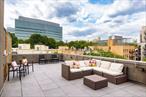 Enjoy city living in this spacious triplex penthouse in the heart of Harlem. With 1, 555 square feet, this three-bedroom, two-bathroom home offers comfortable living across three floors and a large private roof deck perfect for relaxing and entertaining.The Top Level of the home offers a tranquil private roof deck with sweeping views all the way to Billionaire&rsquo;s Row. Spend your days relaxing under the large sun shade and your evenings dining al fresco with the convenience of a Wi-Fi-controlled grill and smoker. Completing this level is a queen-size bedroom with soaring ceilings and custom shelving, which is ideal for guests, a second home office, or a media room.On the main level, an open-concept great room is bathed in natural light through a wall of oversized tilt-and-turn windows, offering wide-plank oak floors and three custom-outfitted closets. The European-inspired kitchen is a chefâ€™s dream outfitted with a Bosch five-burner dual-fuel range and an XO hood, a Blomberg built-in refrigerator, a Blomberg dishwasher, and an LG microwave below the counter. There is ample room for a formal dining for up to 12, a large living area, and a full bathroom with floating cabinetry, three mirrored vanity cabinets, and a tub with a shower.The lower level of the home features its own entrance, accessible via the elevator, and includes two bedrooms, each with two oversized tilt-and-turn windows and closets that offer custom storage. The second spa-like bathroom is located on this level and is adorned with herringbone finished marble tile floors, separate glass enclosures for the private shower and private water closet, and a deep Duravit soaking tub. This level is complete with a foyer large enough for a separate home office or mud room and private, in-unit laundry.2457 Frederick Douglass Blvd. is a boutique, pet-friendly condominium conveniently located near Morningside and St. Nicholas Parks and shopping at Trader Joeâ€™s, Whole Foods, and 125th Streetâ€™s retailers. The A/B/C/D subway at 125th Street and multiple bus lines make commuting easy.