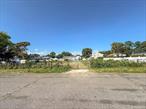 Land nestled on a spacious 125 x 100 lot in a quiet Lindenhurst cul-de-sac, this property offers a prime development opportunity with subdivision potential. Ideal for investors or buyers looking to build their dream home, the site is currently in the process of being subdivided for two 2, 000 sq. ft. residences, each with a full basement. Construction drawings are available upon request, and sewer spurs are already in place at the street for easy connection. The existing survey reflects a previously razed property, making this a ready-to-go project.