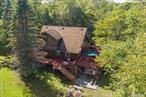 Discover this charming three-bedroom, two-bathroom Cedar Cabin nestled in scenic Roscoe. The generous lot provides ample space for outdoor enthusiasts to create their perfect retreat. Whether you&rsquo;re planning garden parties or simply enjoying morning coffee surrounded by nature&rsquo;s tranquility, the expansive outdoor area delivers endless possibilities. Located near Butternut Grove Campsite and great trout fishing locations, outdoor adventures are practically at your doorstep. The thoughtfully designed interior features a comfortable layout, ideal for various living arrangements or hosting guests in this peaceful haven.