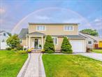 Renovated and move in ready Expanded Cape in the heart of Syosset! Offering 2, 087 sq ft with 5 bedrooms and 3 full baths, this home combines space, style, and convenience. Enjoy a sunlit open floor plan with a modern kitchen, stainless steel appliances, and formal dining area. The finished walk-out basement provides extra living and storage space, while the landscaped yard and private garage add comfort and functionality. Located minutes from shopping, dining, coffee shops, and the Syosset LIRR