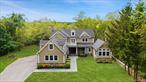 Welcome home to this beautifully crafted and meticulously maintained colonial, perfectly set on 9 acres of serene natural beautyâ€”offering the comfort, elegance, and charm youâ€™ve been searching for!Step through the grand mahogany doors and discover a spacious living room with a cozy fireplace, an elegant dining room ideal for holiday gatherings, and a stunning French Country kitchen with a massive center island. The kitchen seamlessly opens to a spectacular family room, where a fireplace and coffered ceiling add an extra layer of sophistication to this custom home.Just off the kitchen, youâ€™ll find both a butlerâ€™s pantry and food pantryâ€”perfect for staying organized whether entertaining or enjoying everyday living. Additional conveniences include a powder room, mudroom and a separate laundry room with abundant cabinetry and a utility sink, copper gutters, and a large two car garage with custom mahogany garage doors. Up the grand stairway awaits 3 generously sized bedrooms, a library, bonus room, and 3 full bathroomsâ€”designed to accommodate the whole family. The primary suite feels like a spa retreat, featuring tray ceilings, French doors leading to a private balcony, two large closets, and a luxurious bath with double vanity, jacuzzi tub, and shower.Outdoor living is equally impressive, with two large balconies accented with Azek trim and cedar, a romantic Juliet balcony, and a stunning covered side porch. Whether youâ€™re looking to enjoy your morning coffee, enjoying an evening glass of wine, or hosting lavish parties, this property offers all the outdoor space you can dream of. Throughout the home, youâ€™ll find abundant windows filling each room with natural light, plus plentiful closets, built-ins, and storage. Award-winning schools, tranquil neighborhood, central air conditioning, and exquisite exterior stonework are just a few of the many additional perks.This exceptional property truly checks every box. Donâ€™t miss the opportunity to make it your forever home!