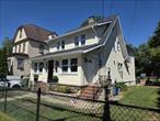 Charming 2-bedroom, 1-bath on 2nd floor apartment with parking and a spacious backyard, perfect for entertaining. Ideally located in downtown Harrison, just two blocks from the train and shops
