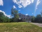 4-bedroom home with 2 full bathrooms and a half bath located in Bloomingburg, NY.
