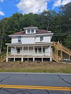 Attention investors! Freshly redone multi family in the midst of the Roscoe Hills. 2 3 bedroom units and 1 1 bedroom unit. Great potential.