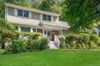 Welcome to Hidden Hollow, one of the most sought-after neighborhoods within The Chappaqua School District. This pristine move-in ready four-bedroom Colonial offers the perfect balance of privacy, natural beauty, and convenience as well as access to a private, lifeguarded swimming lake. The home has been meticulously maintained and updated with top quality products and lots of love. From the moment you arrive, the professionally landscaped grounds, custom brick walkway, and inviting covered front porch set the stage for the warm and elegant interiors within. Inside, the light-filled living room with a bay window and pegged oak flooring flows seamlessly into the formal dining room with sliders to an expansive rebuilt trex-style deck (2021) overlooking the serene wooded backdrop and babbling brook. The updated chefâ€™s kitchen features granite counters and island, stainless steel appliances (new in 2023), two sinks, and direct access to the oversized deck, open to the adjacent family room impresses with its fireplace, Palladian window, floor to ceiling built-ins, and sliding doors to the backyard. Perfect for everyday living and entertaining. Upstairs, the spacious primary suite is a true retreat with vaulted beamed ceilings, oversized windows, two walk-in closets, and a spa-inspired double bath with dressing area, skylight, and marble counters. Three additional bright bedrooms and a renovated hall bath complete the second level. The walkout lower level offers incredible versatility with a large windowed second family room, with door out, office, large laundry room, cedar closet, and custom storage. Notable upgrades include a whole house generator, AC, Andersen windows, central vacuum, full irrigation system, hardwood floors throughout, solid wood doors, whole house attic fan, architectural roof (2014), and a house alarm system.Living in Hidden Hollow means enjoying a coveted lifestyle with swimming and kayaking on the private lake, neighborhood gatherings, and easy access to local favorites such as DeCiccoâ€™s Market, Rockyâ€™s Deli, Gedney Park, and the North County Trailway. The Taconic Parkway, Metro-North Chappaqua train station, and downtown Chappaquaâ€™s shops and restaurants are just minutes away. Donâ€™t miss this treasure. The home youâ€™ve been waiting for in one of Westchesterâ€™s most desirable communities.