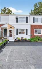 Discover this beautifully renovated 2-bedroom, 1.5 bath townhouse, centrally located in a community with no HOA fees. Current owner UPGRADES include: FURNACE, WATER HEATER, HEAT PUMP (with its own mini electrical panel), WHOLE HOME SECURITY SYSTEM, and DISHWASHER for worry-free living. Other appliances purchased in 2024.This bright and airy turn-key property offers three levels and each boasts ample storage. The main level features a welcoming living room, dining area, convenient powder room, and laundry room, all leading to a stunning kitchen flooded with light thanks to 2 skylights and sliding patio doors. The well-maintained backyard, complete with a newly rebuilt deck (2024) and custom pergola (2025), provides an ideal setting for relaxation or entertaining. On the upper level, you will find two spacious bedrooms, each with generous custom closets, along with the full bathroom and a large linen closet. The lower level, which consists of 400 square feet of finished storage space, is not included in the official living area but is currently utilized as an office and media room, offering versatility to suit your lifestyle. Experience modern, convenient living in Dutchess County. Schedule your visit today!