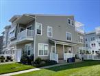 Oceanfront community of Arverne by the Sea. Blocks to the beach and boardwalk! 3 bed, 3 bath triplex with lovely rooftop terrace and backyard space. End unit is bright and sunny with windows all around. Open concept living/dining area. Full sized front-loading washer/dryer in unit. Bedroom and full sized bathroom on first floor. Second floor has two additional bedrooms one with en-suite bath. Third floor has nice sized bonus room leading to rooftop terrace. Tons of closet space. Central heat and air. Garage for storing all your beach gear. Close to all transportation to NYC and local shops and restaurants. Landlord pays water/sewer; tenant pays all utilitiessorry, not pet friendly..........