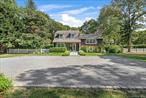 This recently renovated 4 bedroom, 3.5 bath Quogue Village home is filled with light and offers a stunning backyard with an expansive lawn, mature landscaping, heated pool and stone patio. Enter through the welcoming foyer and a primary suite with spa bath and powder room, awaits on the first floor. The main level includes a cozy living room with fireplace, dining area, and well-equipped kitchen. Off the dining room is the outdoor deck for dining and entertaining. The upper level boasts a second primary en suite, two guest bedrooms and a hall bath. A lower level family room provides another entertaining space. The layout lends itself to multiple areas for gathering. Located in the Village with access to the residents-only Quogue Beach. Available for Winter 2025/2026 and Summer 2026.