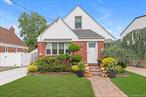 This charming brick Cape Cod in desirable School District 13 offers fantastic curb appeal and is truly move-in ready.Inside, the first floor features 2 spacious bedrooms, a full bath, and a bright living room with an accent wall and electric fireplace, includes high hats. The formal dining area showcases a tray ceiling and bay window, while the updated kitchen includes white cabinets, granite countertops, tile flooring, and gas cooking. Gleaming hardwood floors run throughout.Upstairs, youâ€™ll find 2 additional bedrooms with ample closet space and hardwood flooring. The finished basement is designed for both recreation and functionality, complete with a summer kitchen, gym area, laundry, utilities with gas heat, and a convenient side entrance to the yard.Outside features fully fenced private backyard with lush landscaping, a deck perfect for entertaining, and a patio for relaxation. The newly paved driveway and carport provide easy parking.Enjoy the convenience of nearby parks, schools, and major roadways. A wonderful home in a sought-after location!